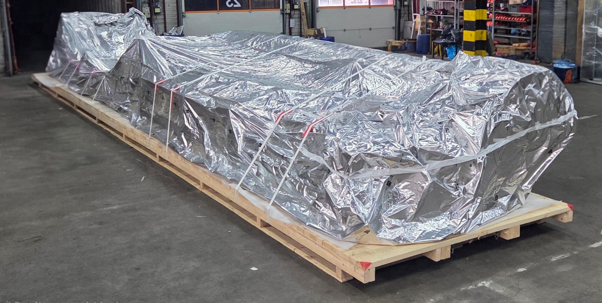 Op maat gemaakte vloer + verpakken op locatie + container stuwage